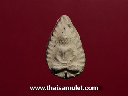B.E.2410 Phra Keeb Bua holy soil amulet (SOM22)