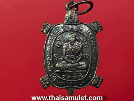 Wealth amulet B.E.2536 LP Liew copper coin in turtle imprint (MON32)