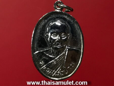 Wealth amulet B.E.2526 LP Parn brass coin with Yant Krok Phet by LP Lersi Lingdam (MON43)