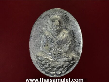 Protect amulet B.E.2536 LP Thuad Nawaloha coin in oval shape (MON98)