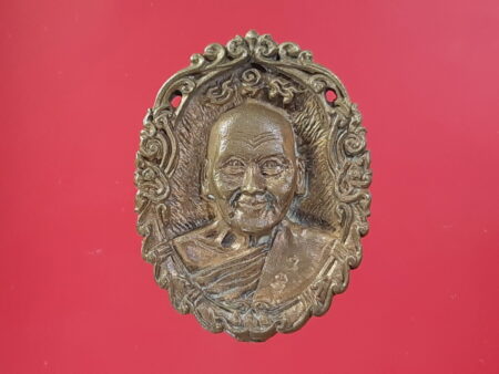 Protect amulet B.E.2534 LP Pern with Phra Phathom Chedi Yant brass coin (MON397)