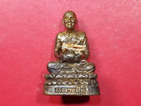 Wealth amulet B.E.2544 LP Du bronze amulet with holy rice and candle by LP Ma (MON509)