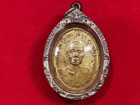 Rare amulet B.E.2512 KB Phrommajak brass coin with silver case in beautiful condition (MON563)
