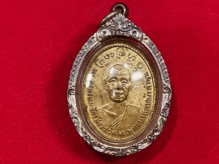 Rare amulet B.E.2512 KB Phrommajak brass coin with silver case in beautiful condition (MON563)