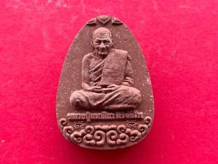 Wealth amulet B.E.2564 LP Maha Sila sits on cloud holy powder amulet in red color with beautiful condition (MON725)
