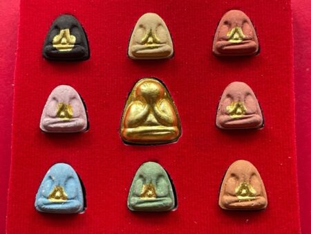 Wealth amulet B.E.2540 set of Phra Pidta holy powder amulets with colorful by Wat Khruewan (PID206)