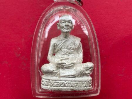 Wealth amulet B.E.2539 LP Pae silver amulet in big imprint with beautiful condition (MON815)