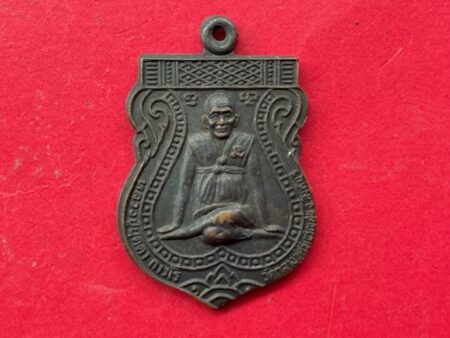 Wealth amulet B.E.2533 LP Budda copper coin in Sema shape – special batch (MON895)