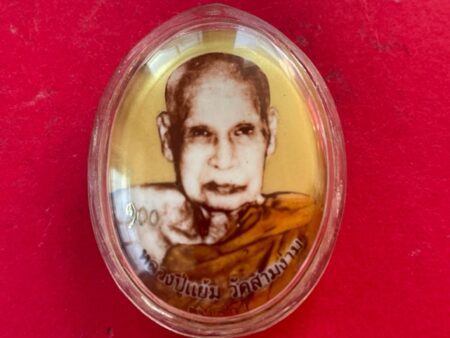 Wealth amulet B.E.2550 Locket LP Yam with golden background and holy powder – 94 years old batch (MON901)