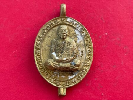 Protection amulet B.E.2555 LP Suealek brass coin with beautiful condition – only 999 coins (MON902)