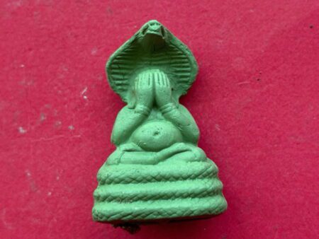 Wealth amulet B.E.2546 Phra Pidta Phang Phra Kran baked clay amulet in green color blessed by AJ Khun Pun (PID251)