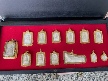 Wealth amulet B.E.2556 set of Phra Somdej holy powder 13 amulets with micron gold casing by Wat Rakhang (SOM756)