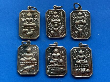 Wealth amulet B.E.2557 Set of Phra Phut Song Sak or Buddha sits on animal copper coins with silver color (SOM812)