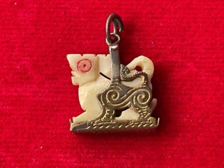 Rare amulet B.E.2515 Singha ivory amulet in beautiful condition with original casing by LP Hom (GOD431)