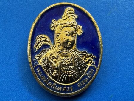Wealth amulet B.E.2537 Guan Yin copper coin in with gold color and blue background by Wat Phananchern (GOD470)