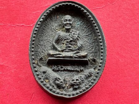 Wealth amulet B.E.2535 LP Pern sits on tiger and boar Nawaloha coin (MON1087)