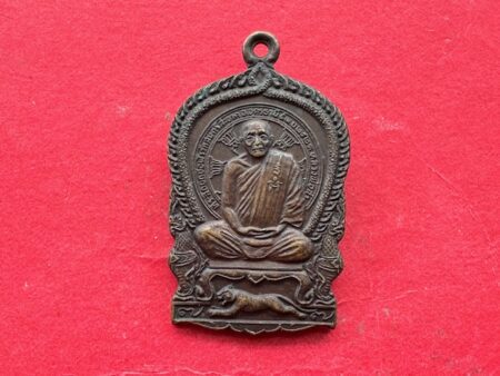 Protect amulet B.E.2521 LP Sa sits on tiger copper coin with beautiful condition (MON1148)