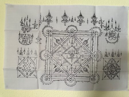 Protect amulet B.E.2550 Pha Yant Phra Pidta Maha Ut Maha Lap or magical cloth by LP Lae (TAK229)