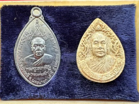 Protect amulet B.E.2523 set of LP Sanit lead coin and holy powder with beautiful condition (MON1163)