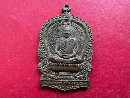 Wealth amulet B.E.2537 LP Mon sits on tray copper coin in beautiful condition (MON1157)