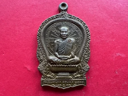 Wealth amulet B.E.2537 LP Mon sits on tray copper coin in beautiful condition (MON1092)
