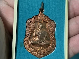Protect amulet B.E.2553 LP Koon copper coin in beautiful condition (MON1147)