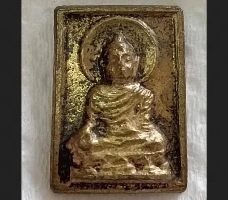 Wealth amulet B.E.2517 Phra Phut Jatupon copper amulet with gold color by LP Waen (SOM1066)